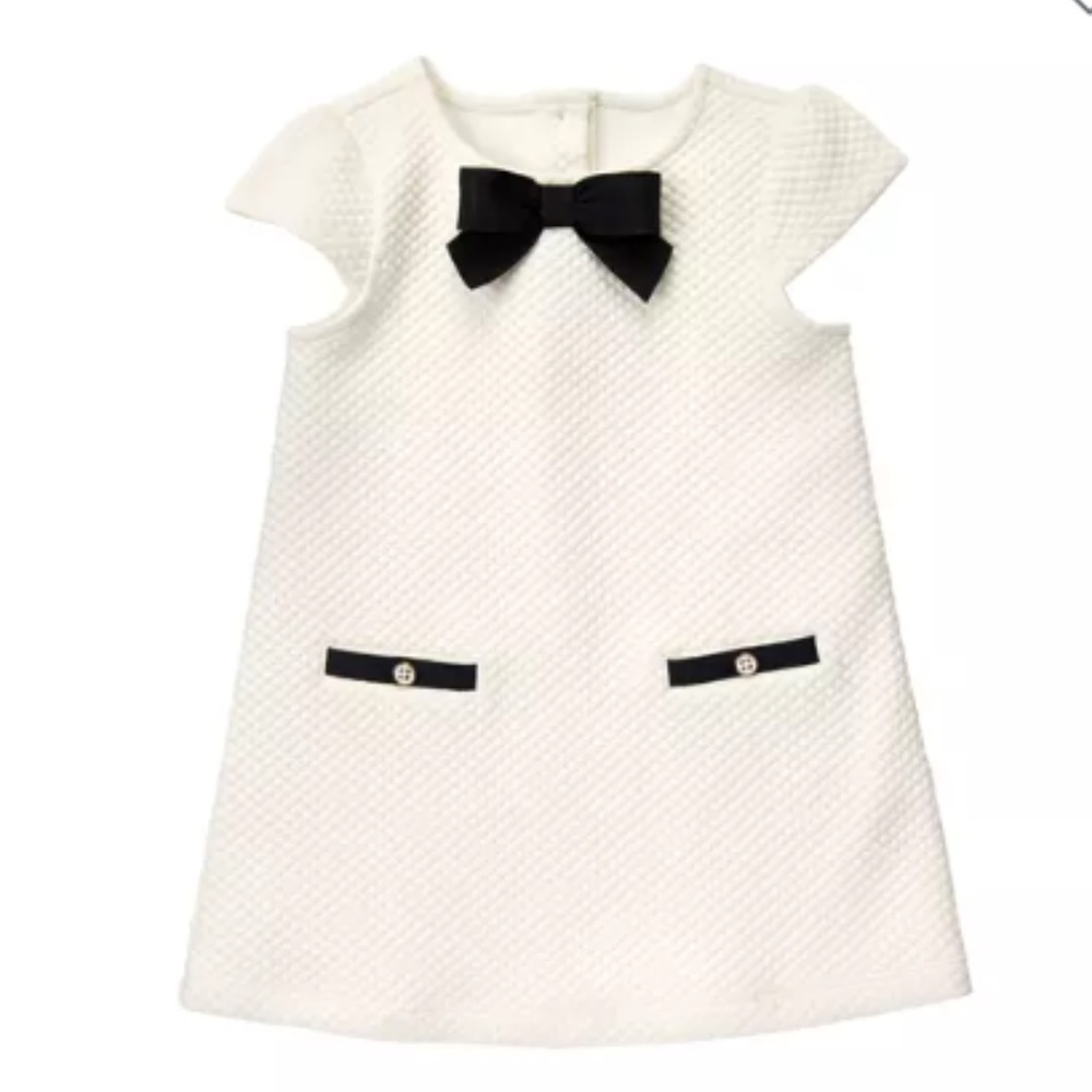 Elegant White Dress with Black Bow